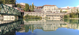 Dora Baltea River And Ivrea Cityscape In Piedmont, Italy